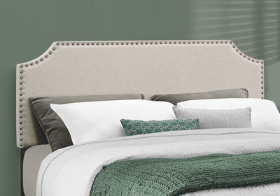 Queen Standard Bed Upholstered With Nailhead Trim And With Headboard
